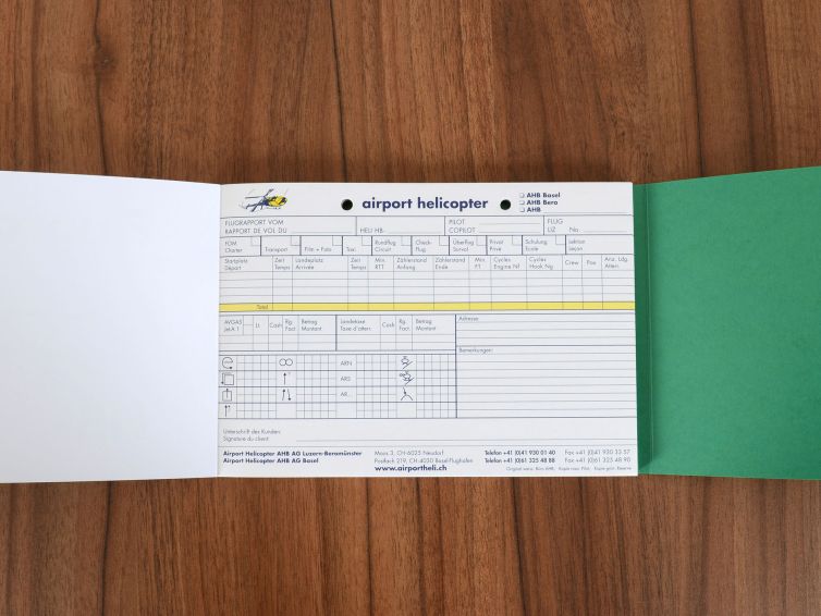 Flugrapportblock mit Schreibschutz, hergestellt von der Firma Wallimann Druck und Verlag AG