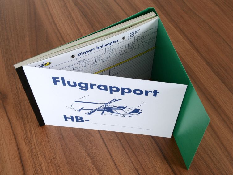 Flugrapportblock mit Schreibschutz, hergestellt von der Firma Wallimann Druck und Verlag AG