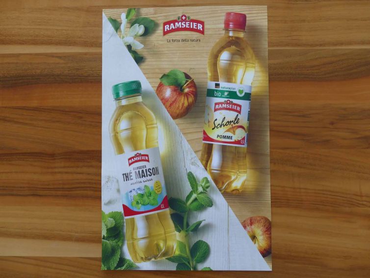 Werbeposter für das Getränk Schorle und Haus Eistee von Ramseier.